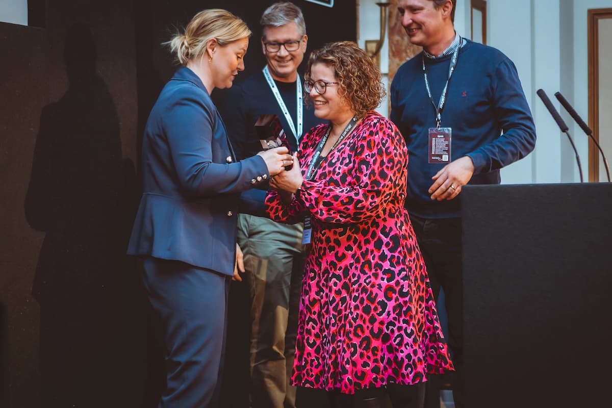 Nicci and Rob Birley, Directors of Cornerstone Resources, receiving Breathe HR award at awards ceremony